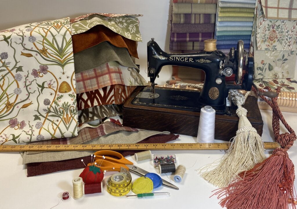 Fabrics, vintage sewing machine, tassels, metre stick, haberdashery. Lindsay's Textiles. Blinds, curtains, net curtains, voiles. Warminster, Wiltshire