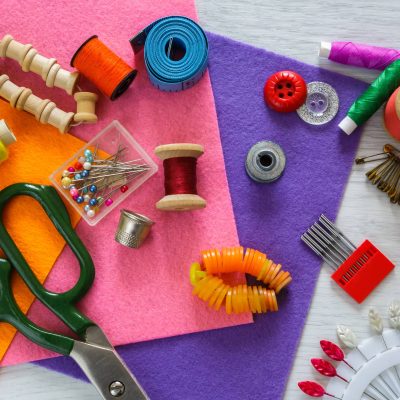 Colourful haberdashery items; felt, needles, buttons, thread. Lindsay's Textiles. Blinds, curtains, net curtains, voiles. Warminster, Wiltshire
