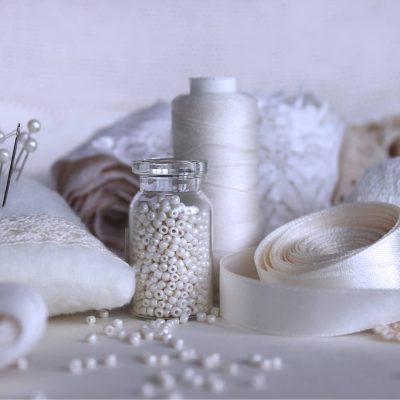 Haberdashery items; threads, sewing needles, beads, ribbon, lace. Lindsay's Textiles. Blinds, curtains, net curtains, voiles. Warminster, Wiltshire