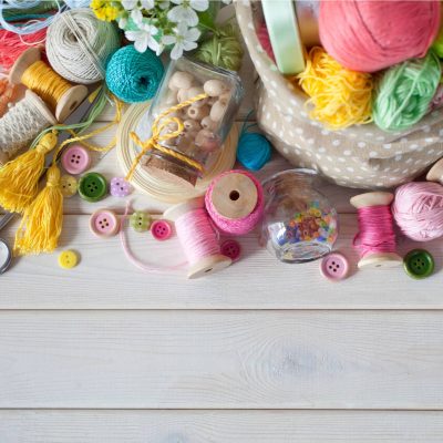 Colourful haberdashery items; thread, yarn, tassels, buttons, beads. Lindsay's Textiles. Blinds, curtains, net curtains, voiles. Warminster, Wiltshire
